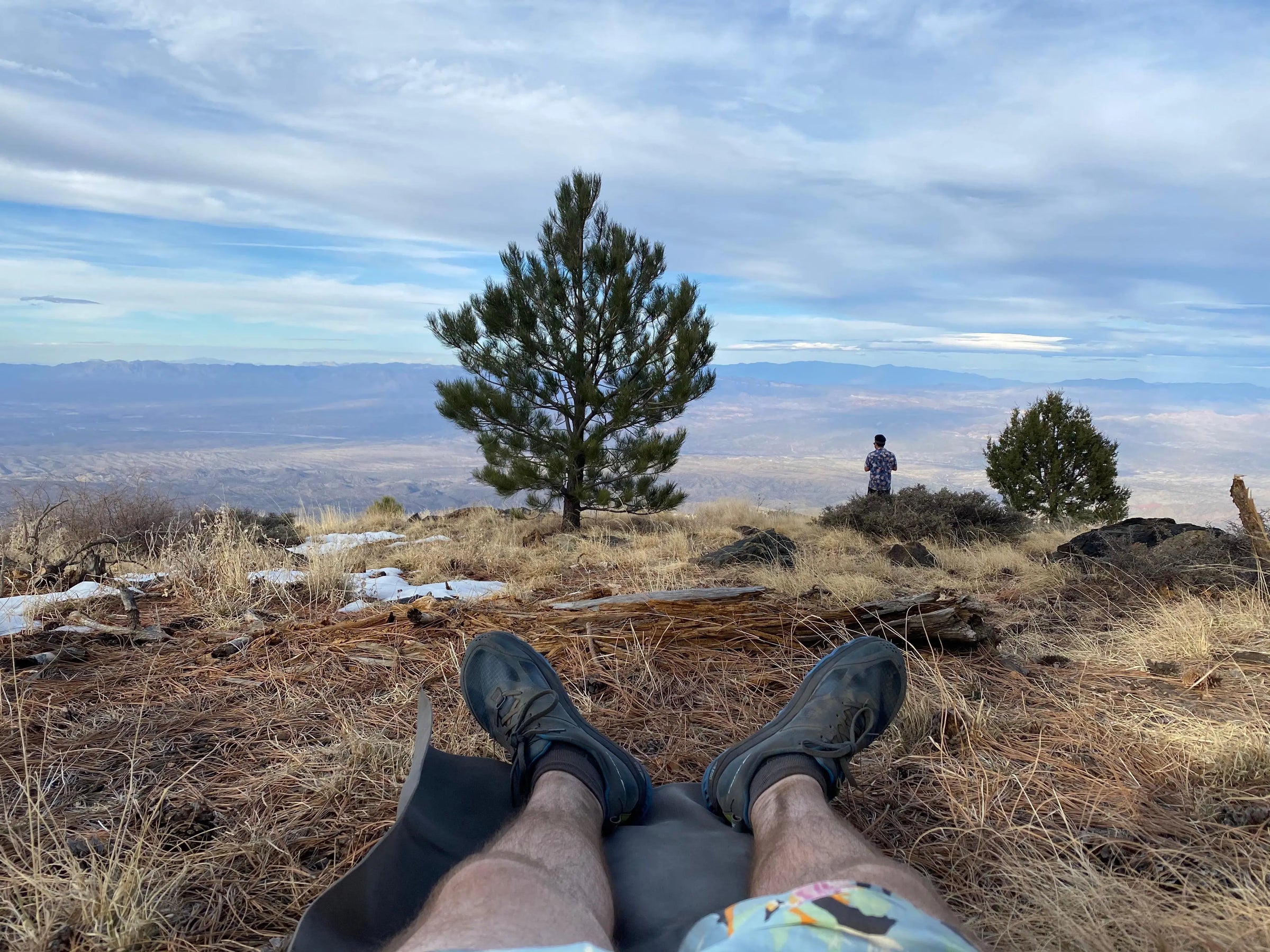 man wearing blister free socks while laying down